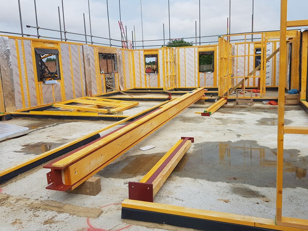 Estructura de madera o de hormigón para una casa pasiva